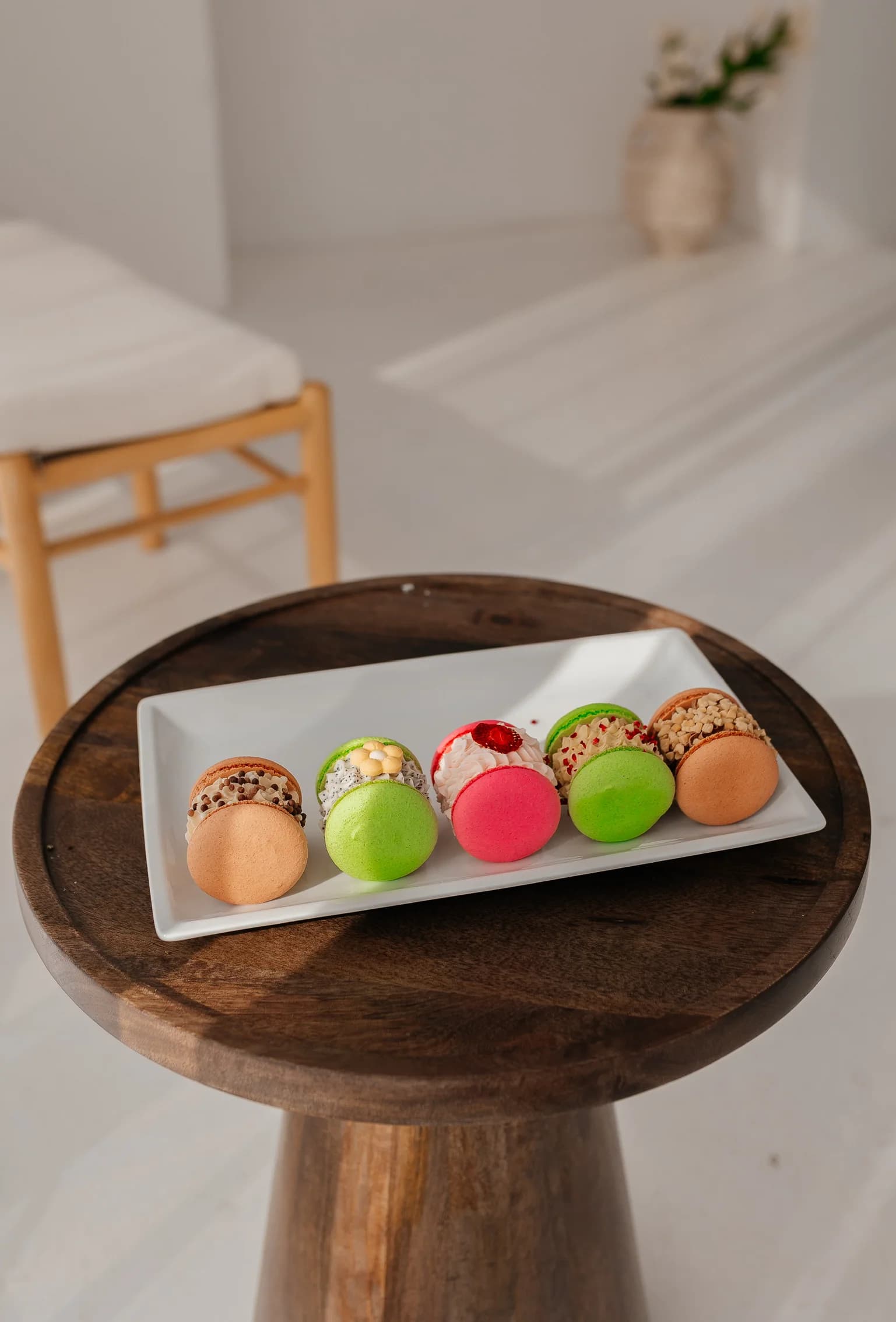A long plate of macarons